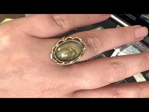 Gouden ring met as van overledene